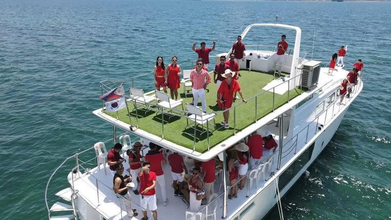 Aerial view of guests on the green deck